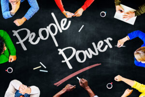 image that says "people power" in chalk